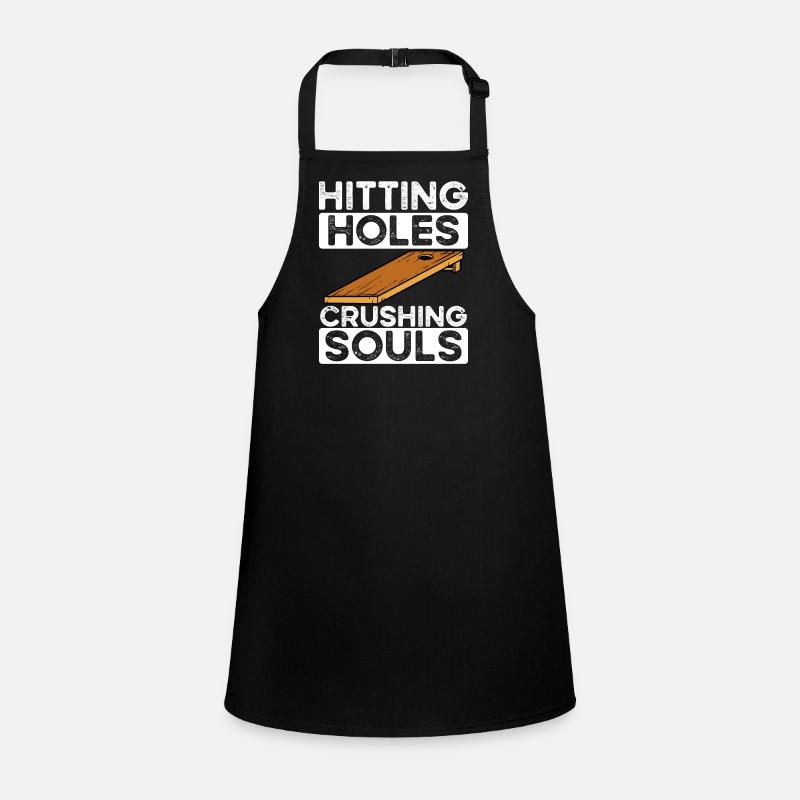 Punching holes in cornhole Children's Apron