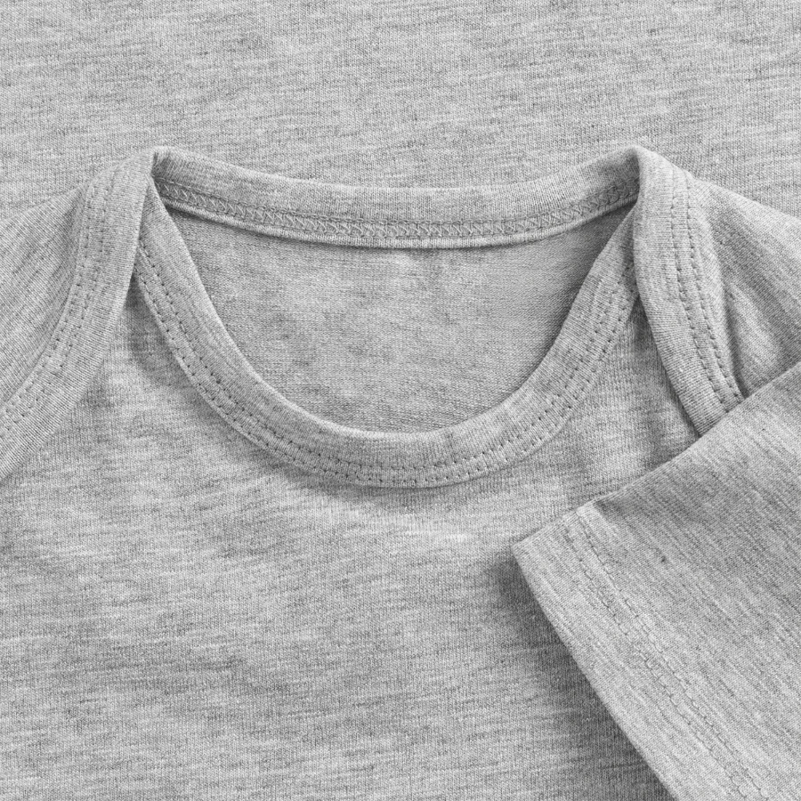 Milan badge on a baby premium organic t-shirt, heather grey, close-up