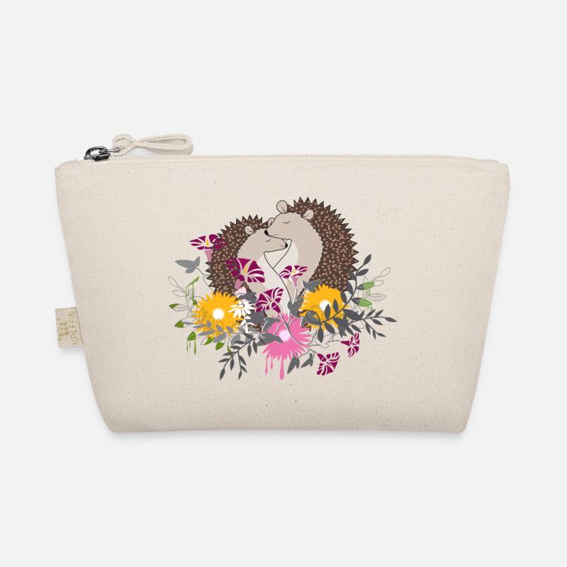 Zwei kleine Igel sitzen gemeinsam im Blumenbeet Bio-Täschchen