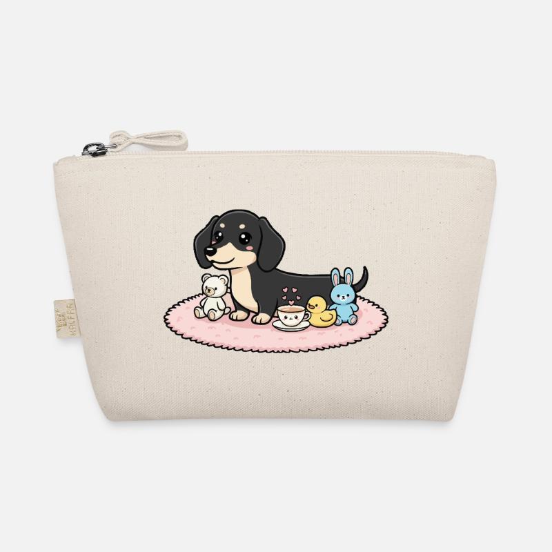 Teckel noir avec des peluches Trousse biologique