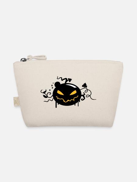 citrouille d'halloween noir avec des yeux brillants - Trousse biologique - nature - Devant