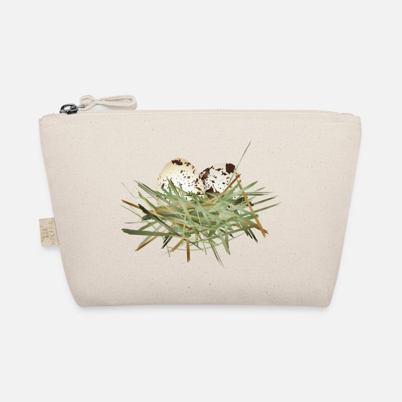 two quail eggs in the hay nest Organic Pouch