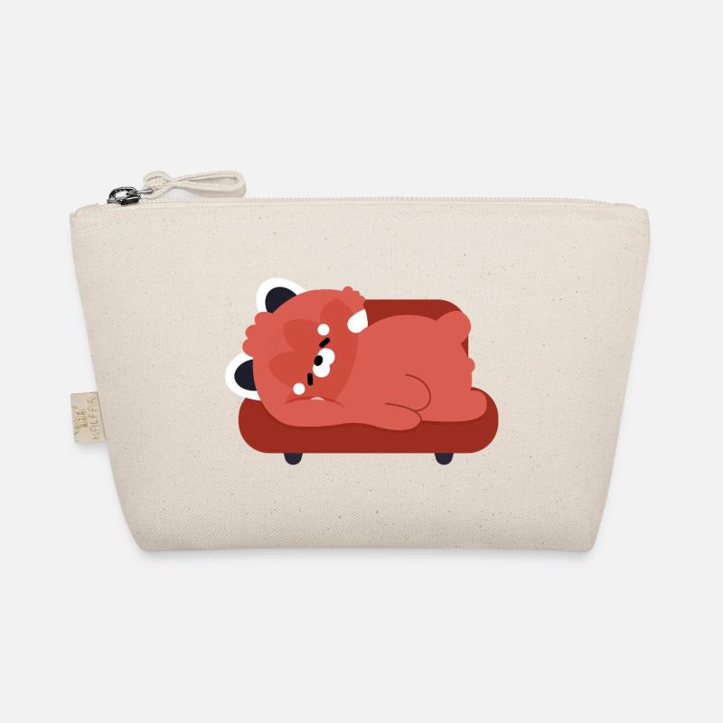 Panda rouge douillet sur le canapé Trousse biologique