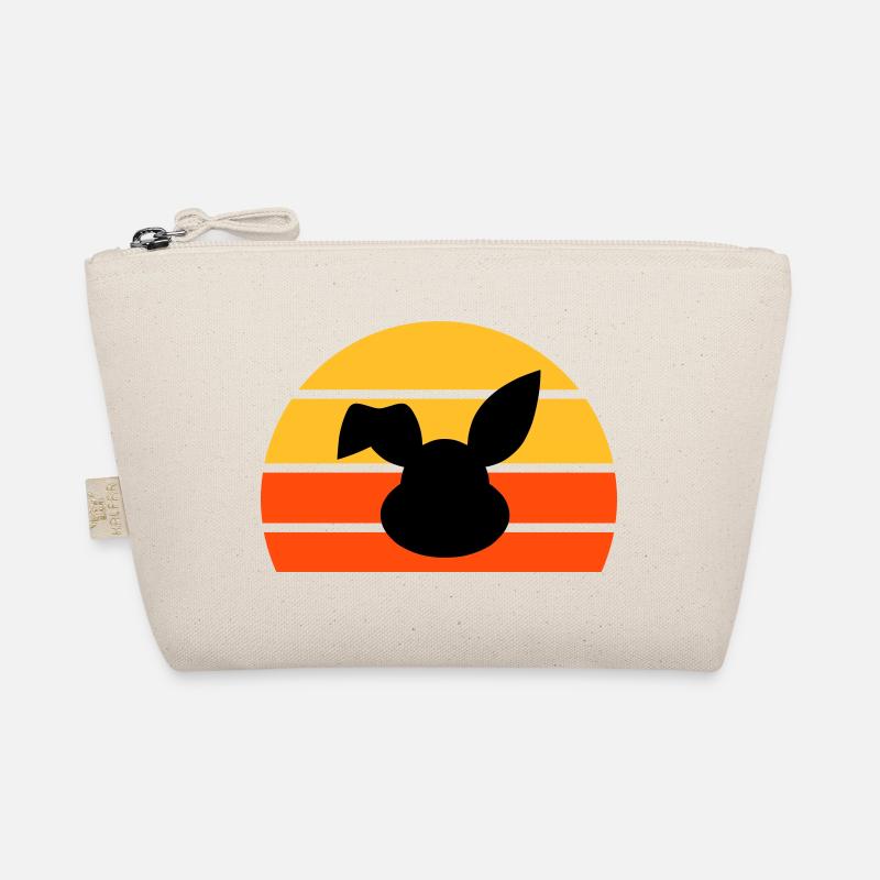 Tête de lapin avec oreille pliée devant un demi-soleil Trousse biologique