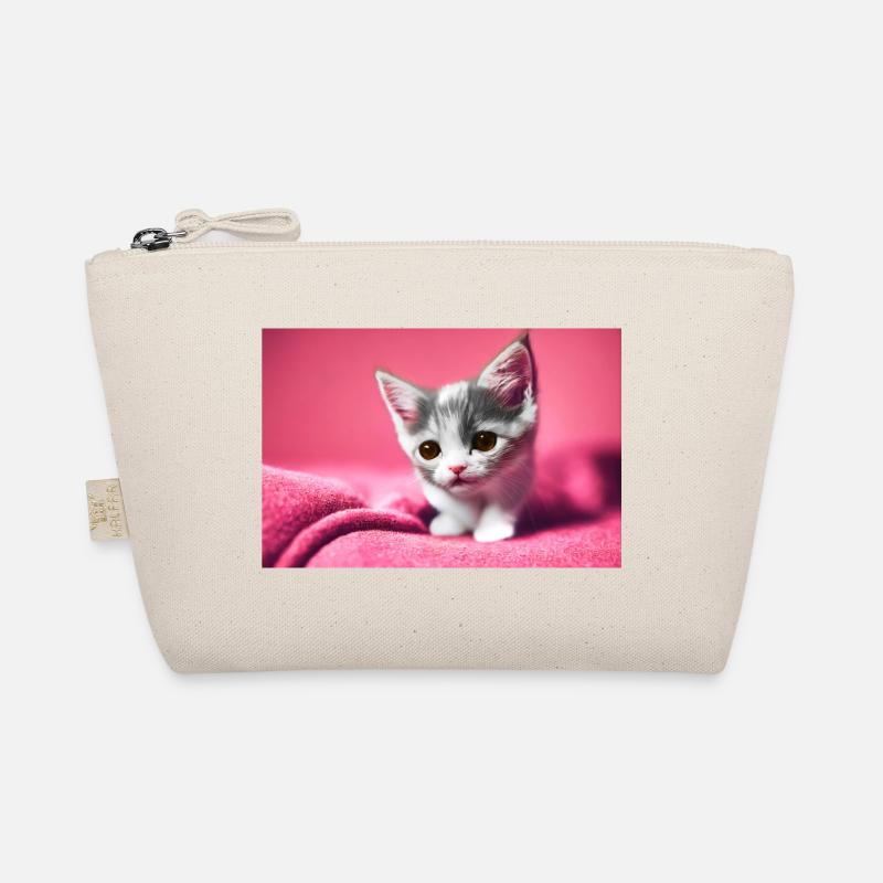 Süßes Kätzchen sitzt auf einer rosa Decke Bio-Täschchen