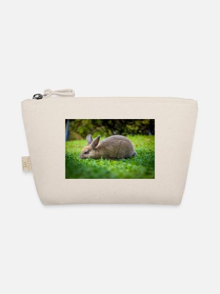 Cozy rabbit in green grass - Organic Pouch - nature