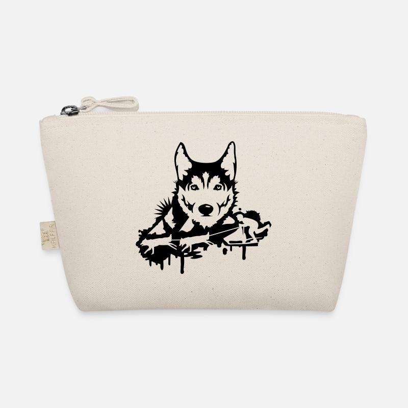 Une course de chien avec une tête husky Trousse biologique