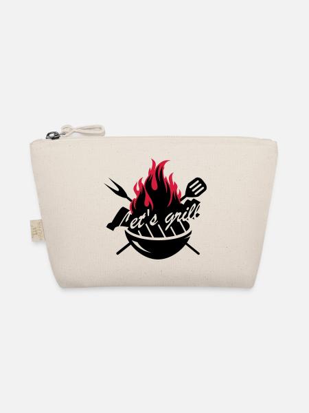 Un barbecue avec des ustensiles de Gril - Trousse biologique - nature - Devant