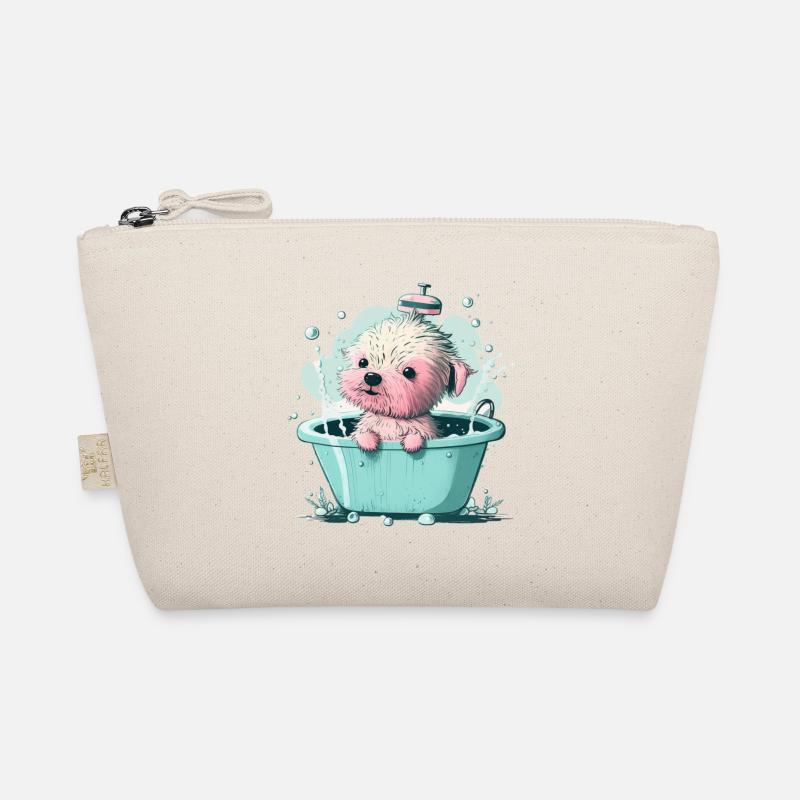 Mignon jeune chien dans la baignoire Trousse biologique