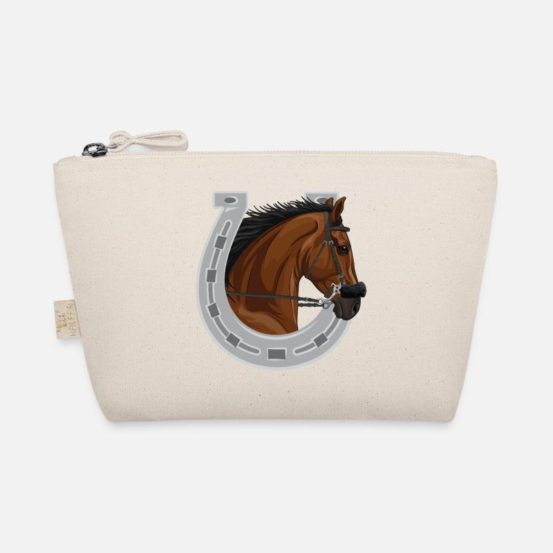 La tête d'un cheval bai et un fer à cheval Trousse biologique