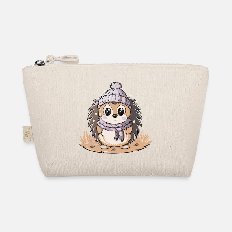 Hérisson mignon avec écharpe et chapeau à pompon. Trousse biologique