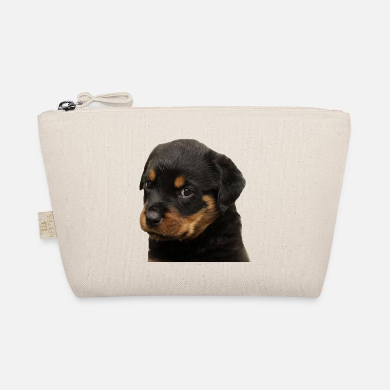 Mignon rottweiler chiot avec de grands yeux Trousse biologique