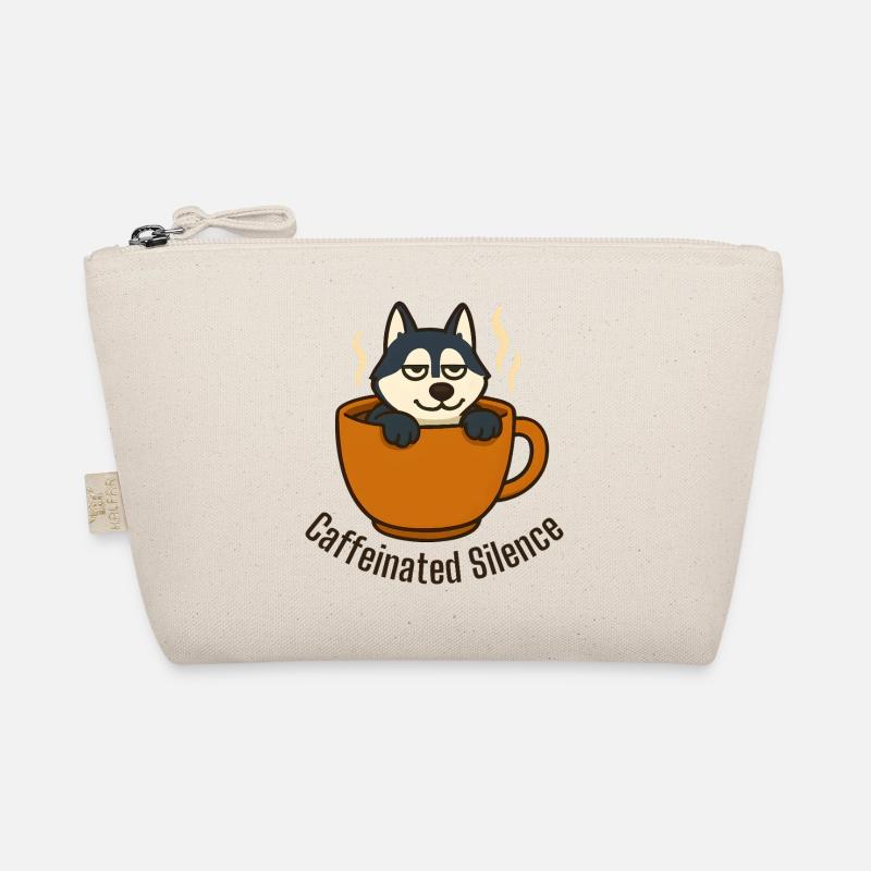 Husky se relaxant dans une tasse à café Trousse biologique