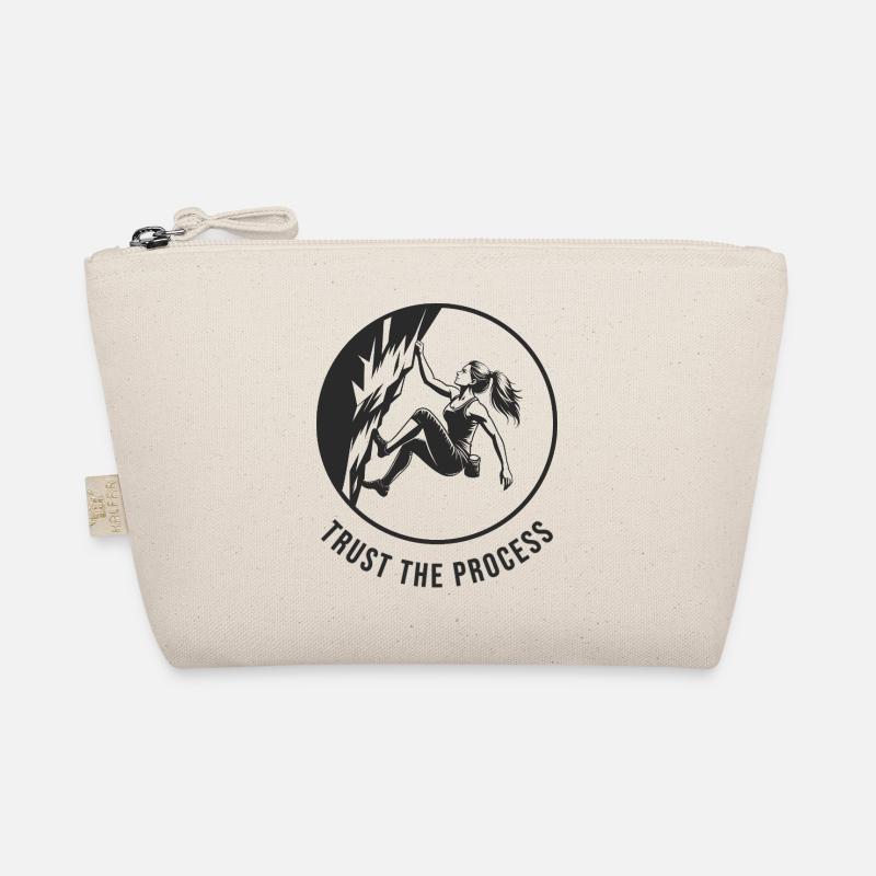 Strong girl bouldering on the rock in the process Organic Pouch