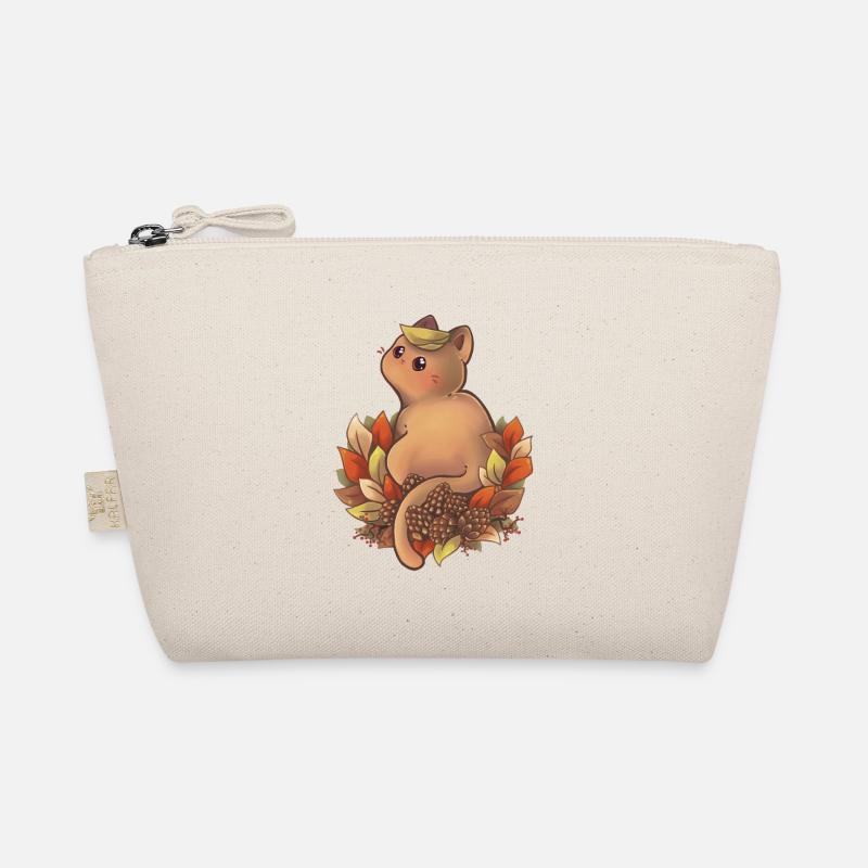 Chat jouant dans le tas de feuilles Trousse biologique