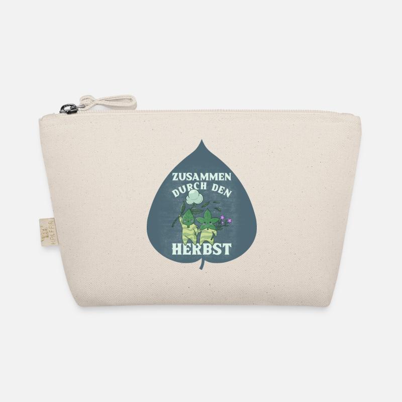 Ensemble à travers le cadeau de feuilles d’automne Trousse biologique