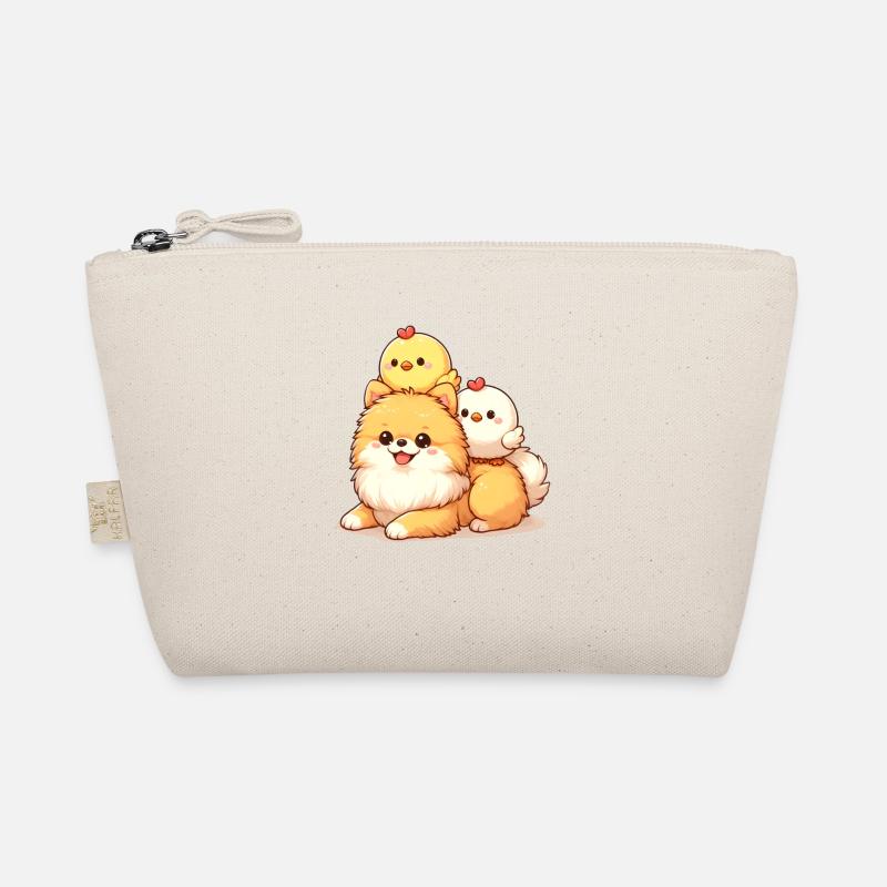 Poussin mignon sur un poméranien Trousse biologique