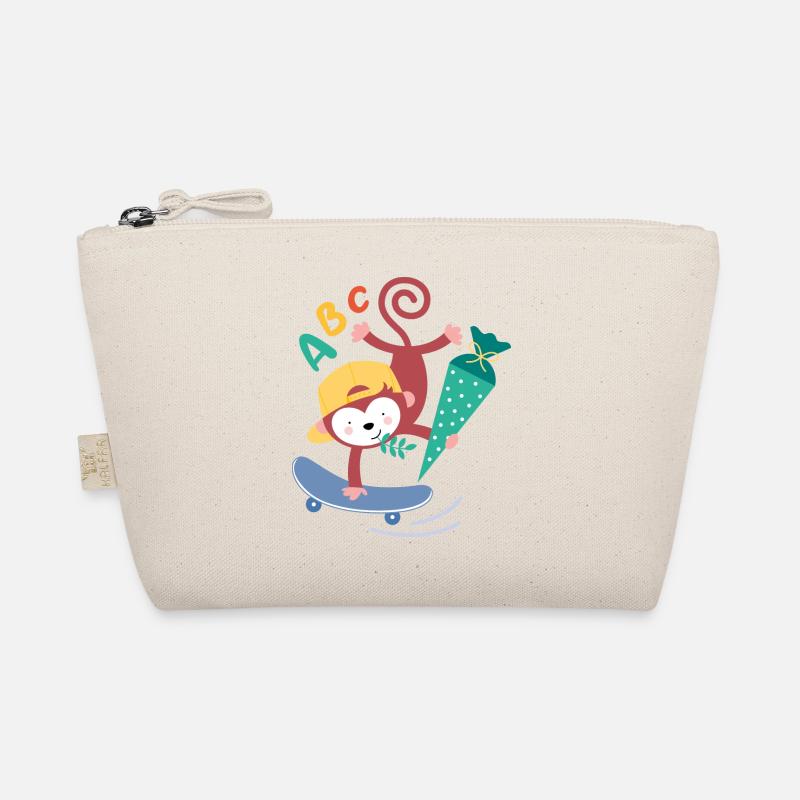 Singe sur planche à roulettes avec cône d’écolier Trousse biologique