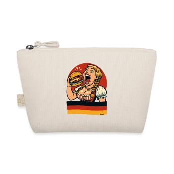 Une femme de Dirndl mange un hamburger géant - Trousse biologique - nature - Devant