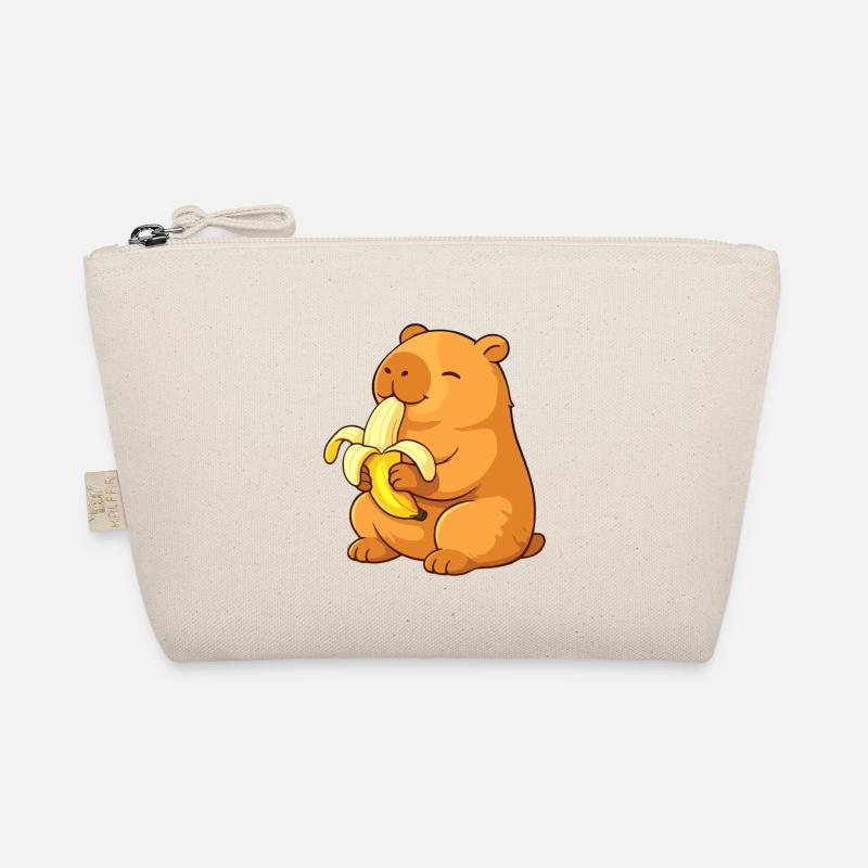 Capybara souriant mangeant une banane Trousse biologique