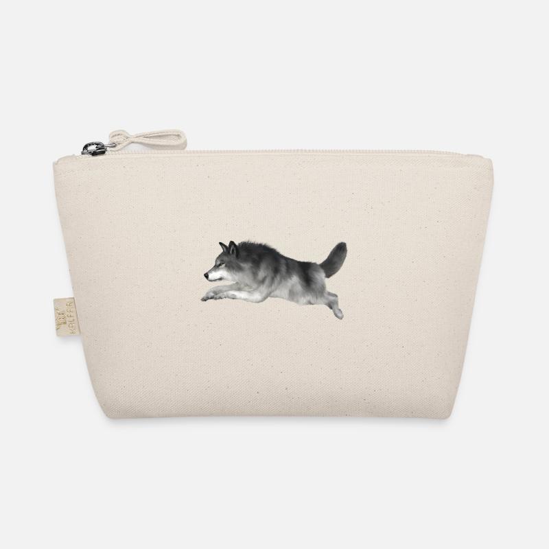 Grauer Wolf rennt Bio-Täschchen