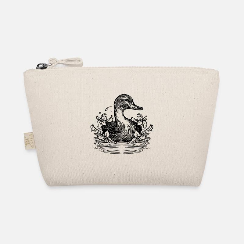 Canard mignon sur le lac avec des fleurs Trousse biologique