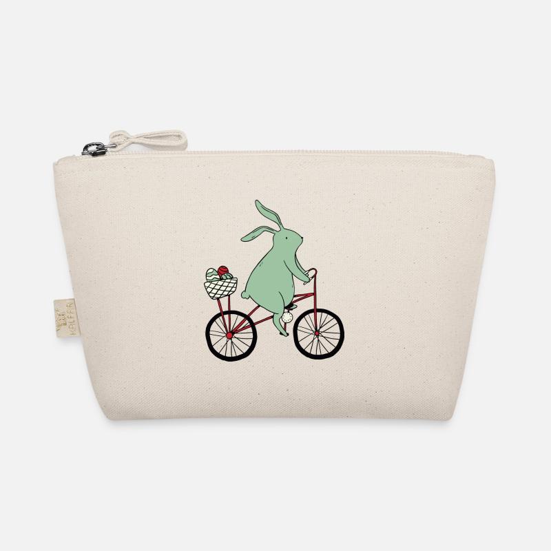 Lapin de Pâques sur vélo Trousse biologique