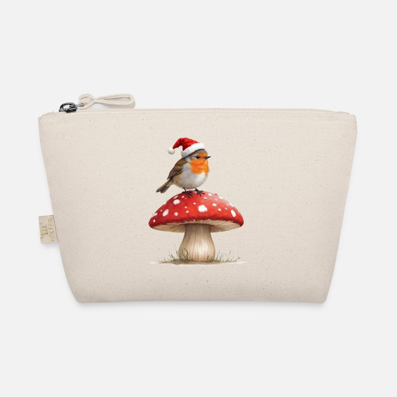 Robin en chapeau de Père Noël sur un champignon rouge Trousse biologique
