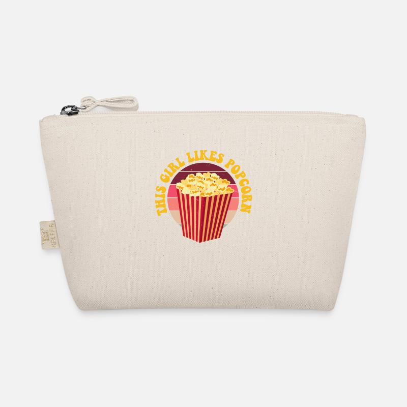 Une fille aime le pop-corn manger du maïs sain Trousse biologique