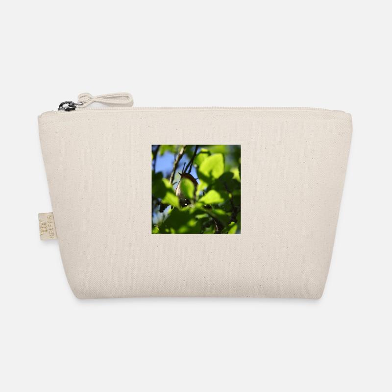 rouge-gorge derrière le feuillage Trousse biologique