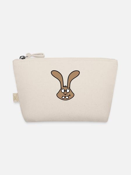 Lapin regarde, plisse les yeux, grimace, drôle, sourire idiot - Trousse biologique - nature - Devant