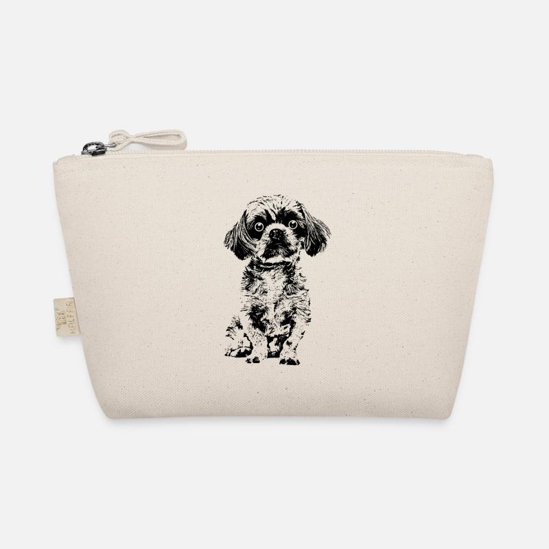 Drolliger kleiner Hund mit große Kulleraugen. Bio-Täschchen