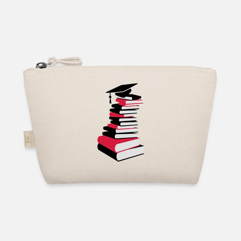 Une pile de livres avec chapeau de graduation Trousse biologique