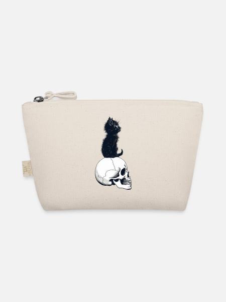 Chaton mignon assis sur un crâne - Trousse biologique - nature - Devant