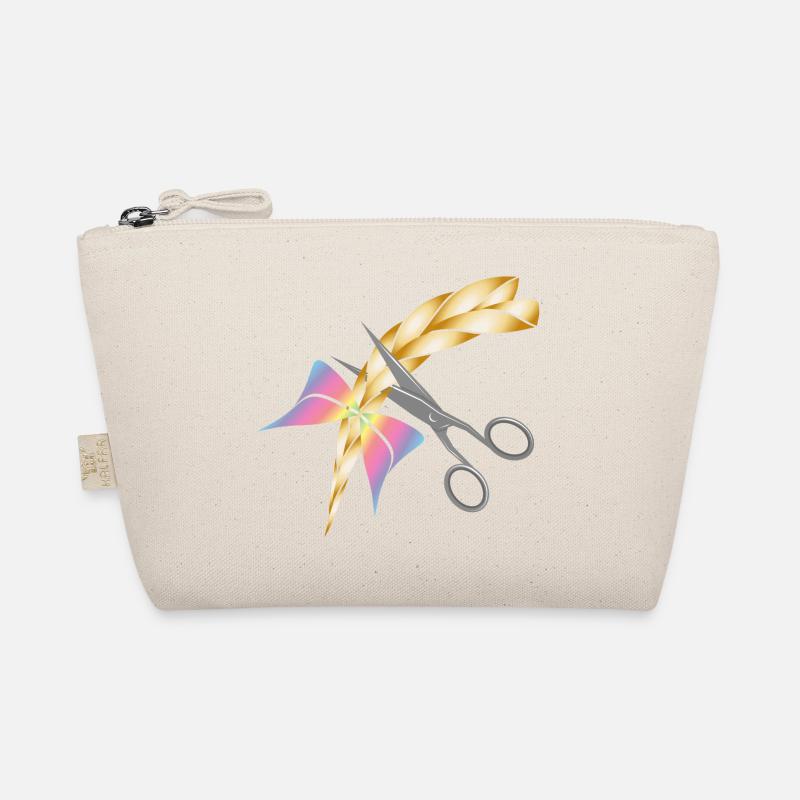 Des ciseaux coupent une tresse blonde Trousse biologique