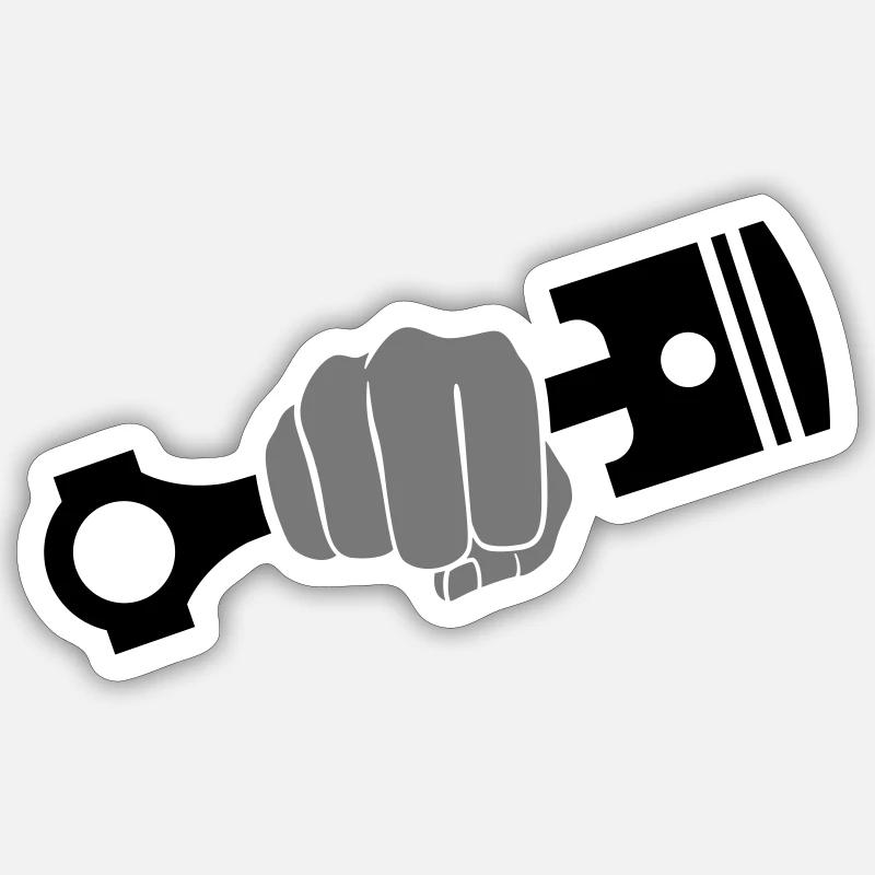 Fist holds engine piston Sticker size S (10 x 10 cm)
