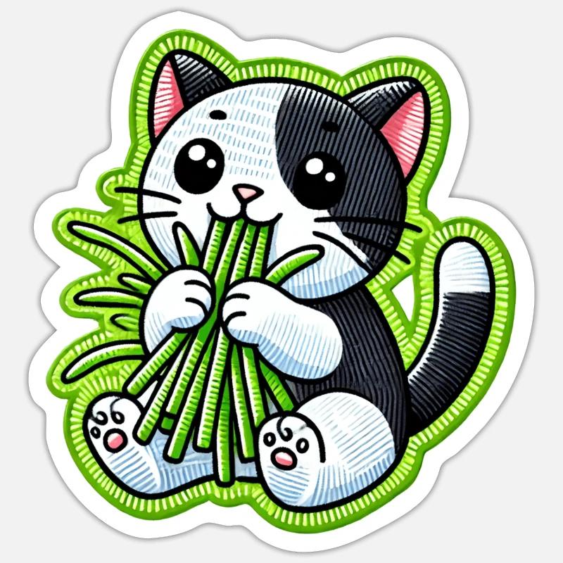 Mignon chat noir et blanc mangeant de l’herbe verte Sticker taille S (10 x 10 cm)