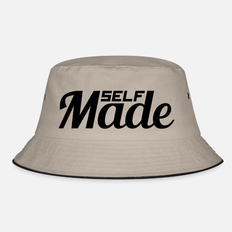 text successful shield logo rich self made man m Bucket Hat