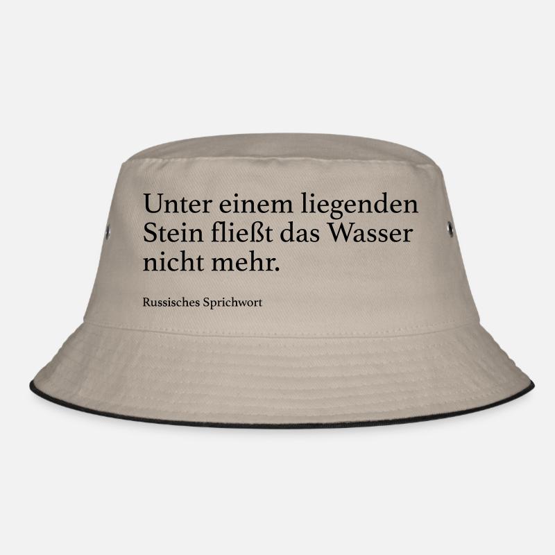Unter einem liegenden Stein fließt das Wasser nic Bucket Hat