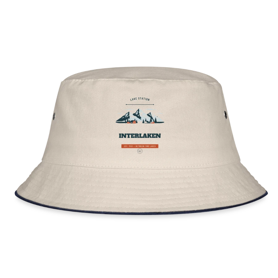 Interlaken badge on a bucket hat, ecru/navy