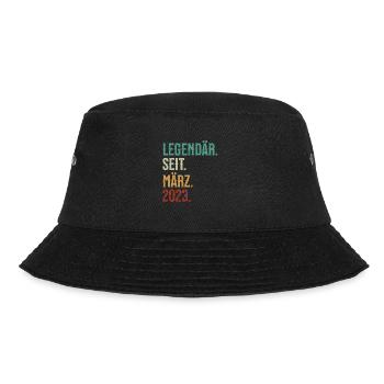 Legendär. Seit. März. 2023. Retro Birthday - Bucket Hat - Schwarz - Vorne - Lela (165cm)