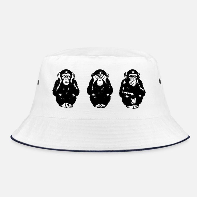 Trois silhouettes de singes en noir et blanc Bob