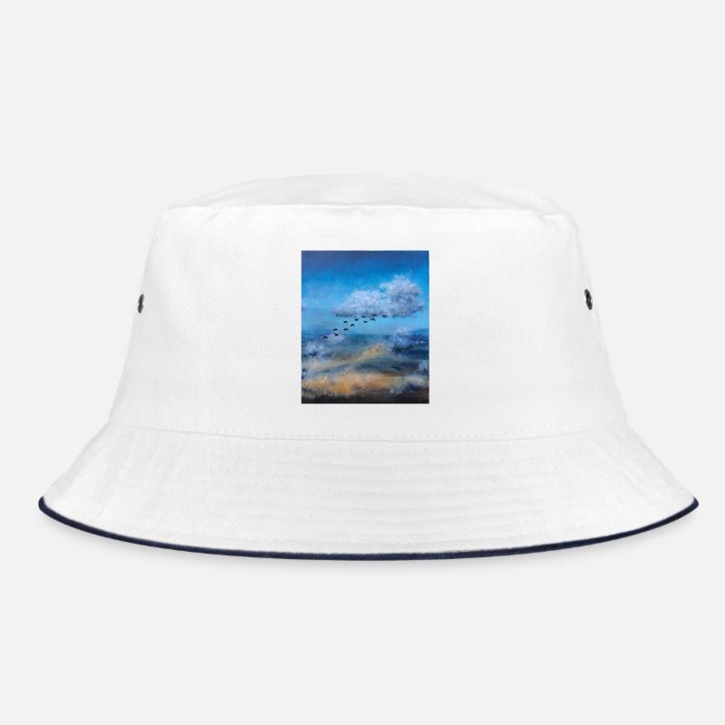 Birds in Flight Over a Cloudy Sky Bucket Hat