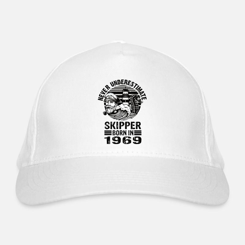 Never Underestimate Skipper né en 1969 Casquette classique bio