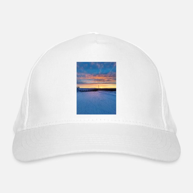 Sonnenuntergang in einer Winterlandschaft Bio-Baseballkappe