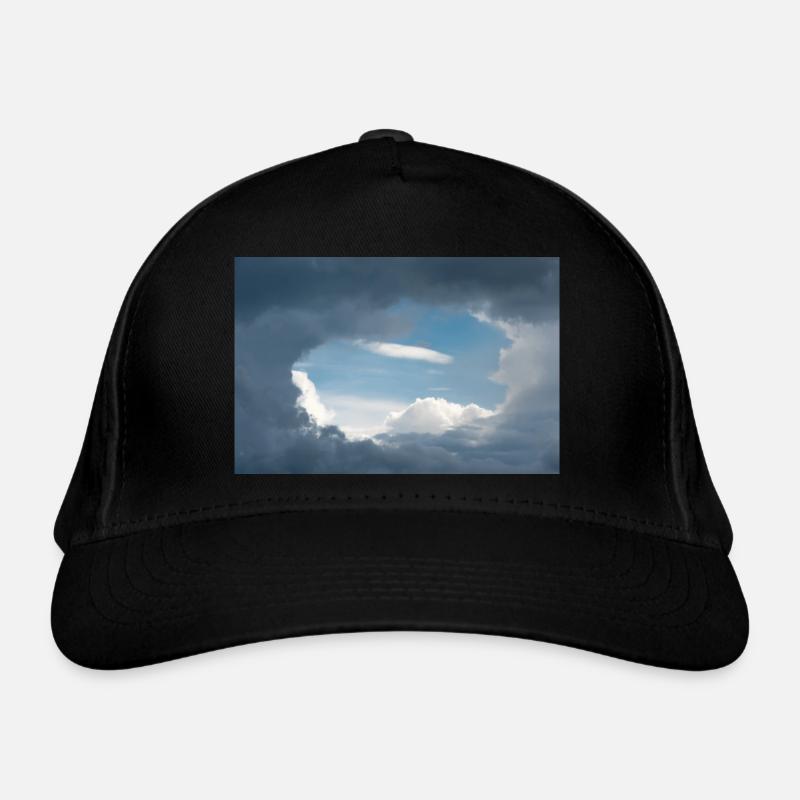 A light hole in the overcast sky Organic Baseball Cap