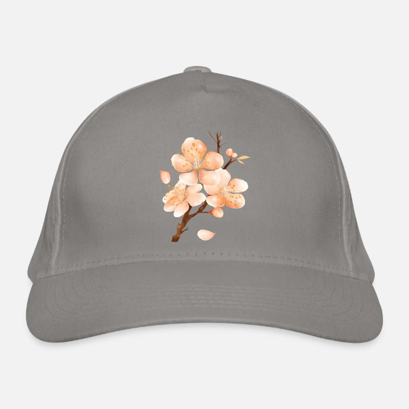 Branche de fleur de pêcher dans un ton pêche doux et velouté Casquette classique bio