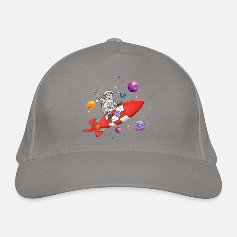 L’astronaute et la fusée rouge dans l’espace. Casquette classique bio