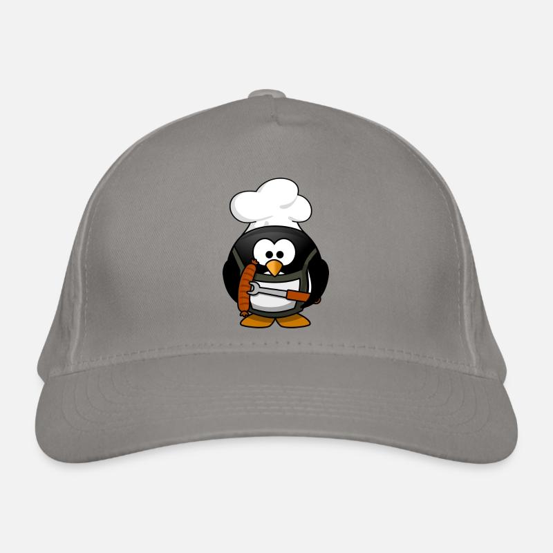 Kochender Pinguin mit Bratwurst. Geschenkidee Bio-Baseballkappe