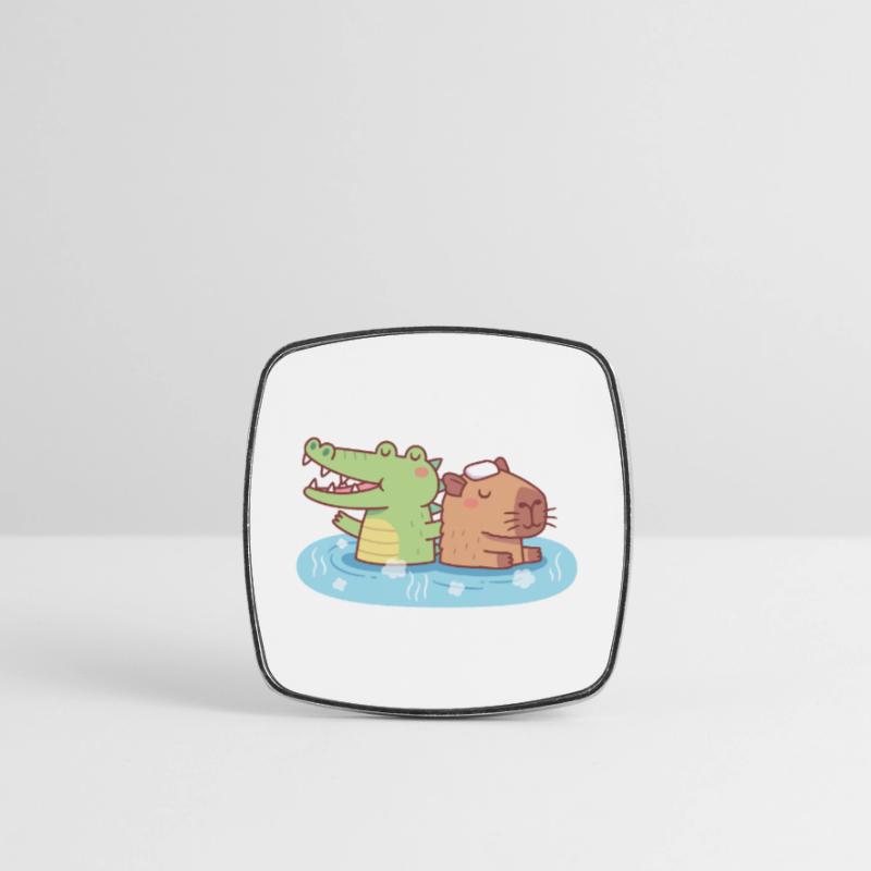Mignon Capybara et crocodile se refroidissant dans une source chaude Magnet carré